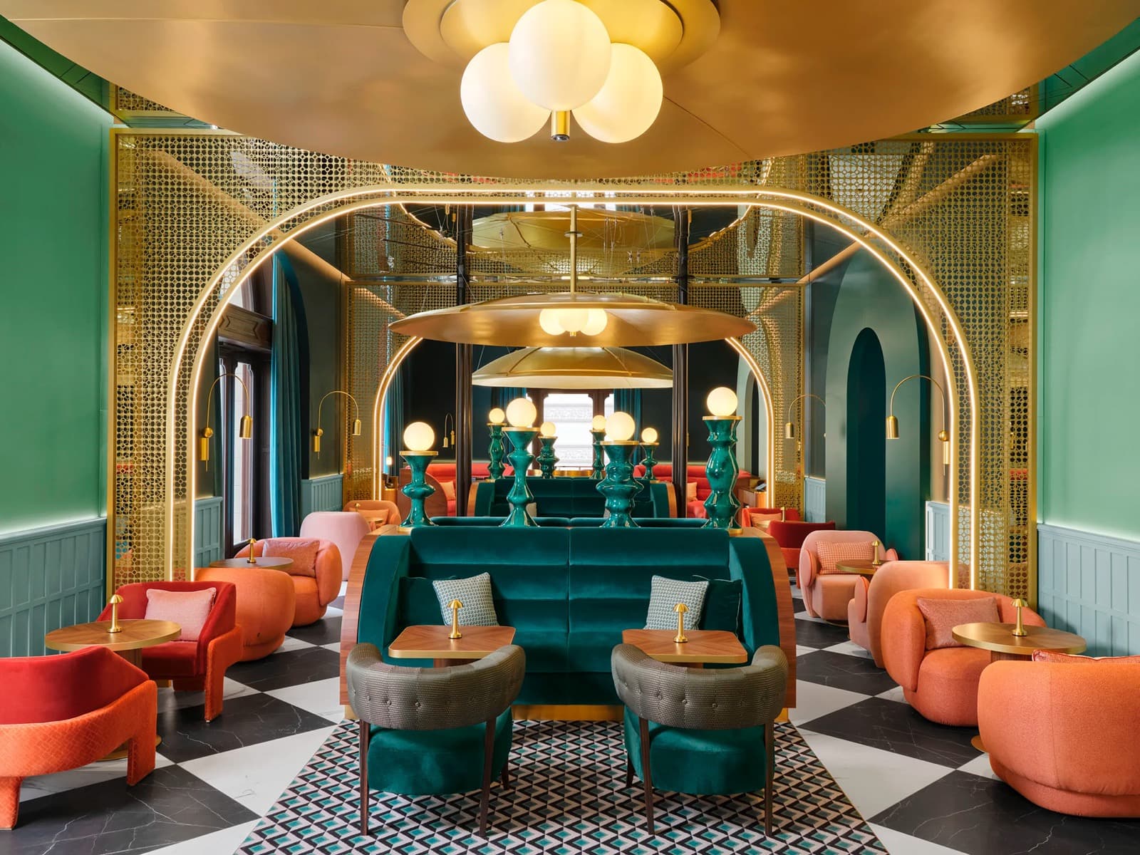 W Budapest interior lounge with illuminated arches and colorful seating